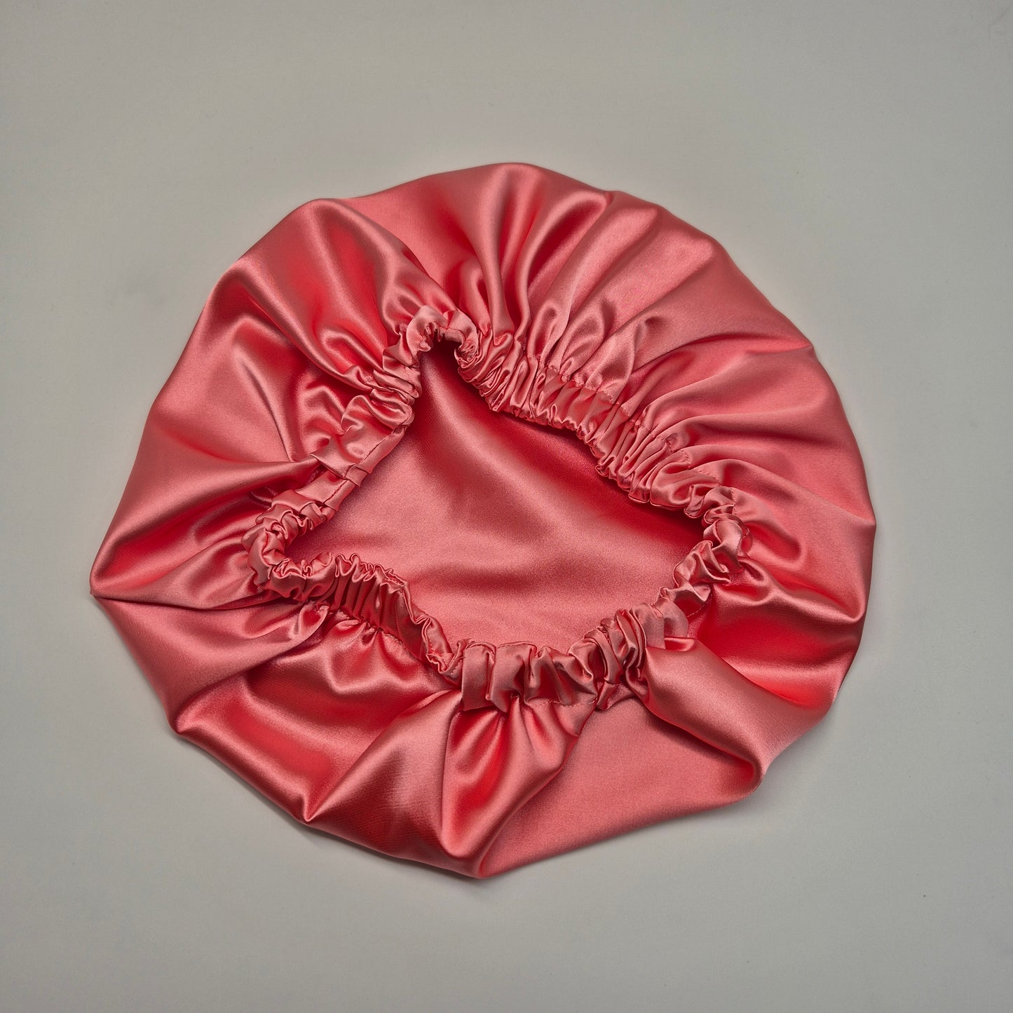 Schlafhaube aus Satin- Koralle